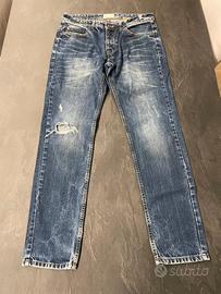 Jeans uomo a vita bassa con strappi Piazza Italia