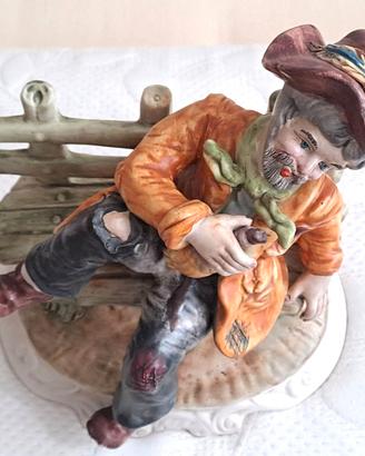 Statua in Ceramica di "Capodimonte" Vecchio Seduto