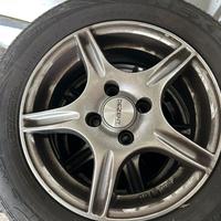 4 cerchi con gomme opel corsa 2004