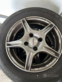 4 cerchi con gomme opel corsa 2004