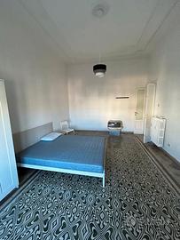 Stanze con balcone vista mare in centro