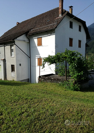 Casa con giardino