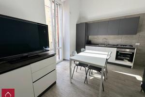 Trilocale ristrutturato + box auto + terrazzo