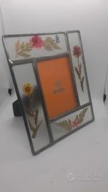 Cornice in vetro con fiori essiccati