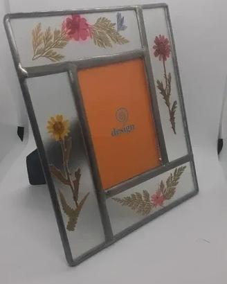Cornice in vetro con fiori essiccati