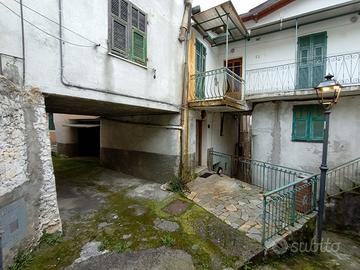 Casa con garge e terreno
