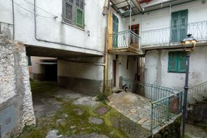 Casa con garge e terreno