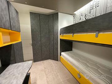 Cameretta letto a castello cabina armadio studio