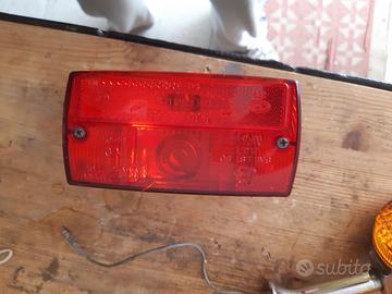 luce faro posteriore moto
