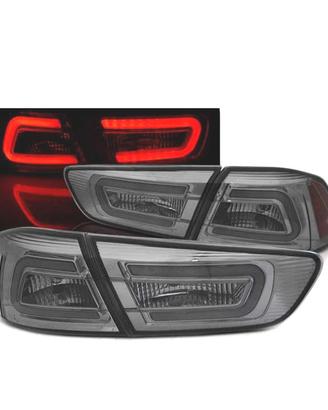 FANALI MITSUBISHI LANCER 8 SEDAN 08-11 BARRE LED F