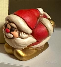 Thun babbo natale sugli sci.