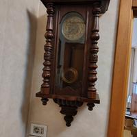 orologio s muro a pendolo