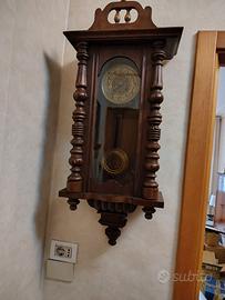 orologio s muro a pendolo