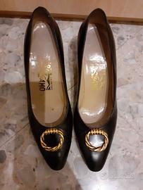 Scarpe con tacco basso