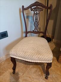 Seggiola bassa con rotelle