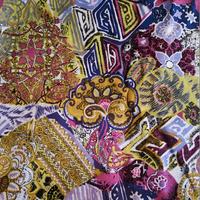 Taglio stoffa fantasia verdolina, bianca e lilla