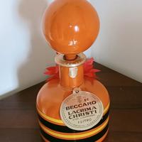 bottiglia di vino. liquoroso.  +. nocino. amaro