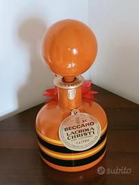 bottiglia di vino. liquoroso.  +. nocino. amaro