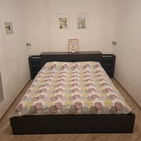 Base letto matrimonialeIKEA con testiera e armadio