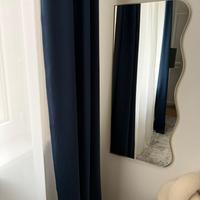 Specchio ondulato da parete