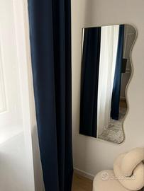 Specchio ondulato da parete