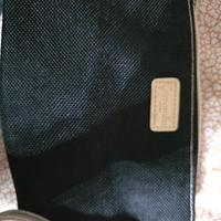 Pochette Camomilla Milano con paillettes cangianti