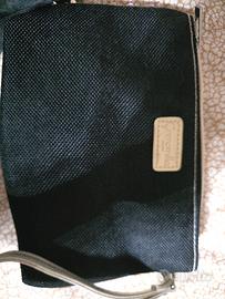 Pochette Camomilla Milano con paillettes cangianti