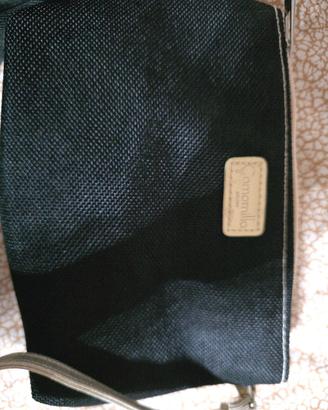 Pochette Camomilla Milano con paillettes cangianti