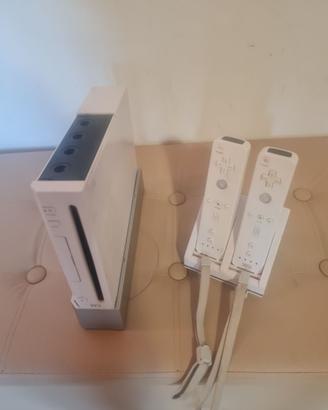 console nintendo wee + 2 joystik  base videogiochi