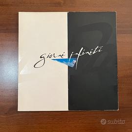I Pooh Giorni Infiniti vinile lp bianco 1986
