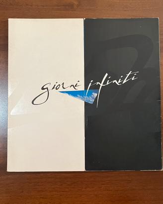 I Pooh Giorni Infiniti vinile lp bianco 1986