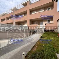 Ville a schiera con solarium