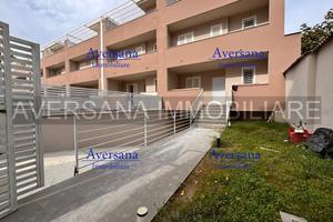 Ville a schiera con solarium