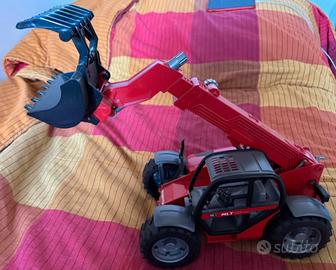 Caricatore Manitou con braccio telescopico