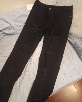 jeans neri strappati