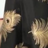 Vestito nero con foglie oro anni 50. Elegante