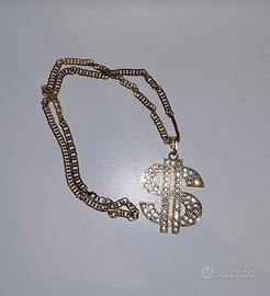 collana e anello con simbolo dollaro 