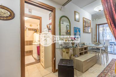 APPARTAMENTO CON GIARDINO PRIVATO E PISCINA CONDOM