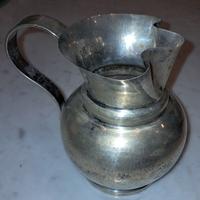 CARAFFA IN ARGENTO LAVORATA A MANO