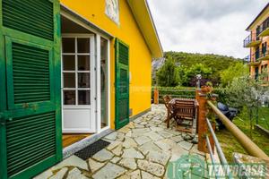 VILLETTA CON GIARDINO E POSTO AUTO