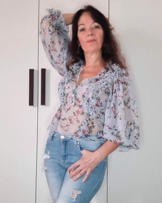 Blusa romantica Zara a fiori con volant