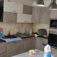 Cucina, letto e divano 