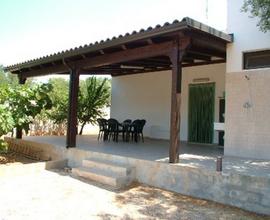 Casa a torre suda con giardino