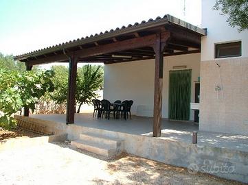 Casa a torre suda con giardino