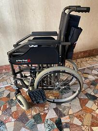 sedia rotelle,deambulatore,americana
