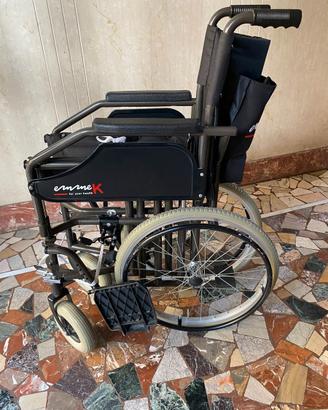 sedia rotelle,deambulatore,americana