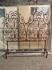 Testata mattimoniale in ferro battuto con ricci