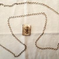 Catena argentata e porta rosario