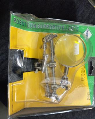 2 blister con supporto e pinze + lente di ingrandi