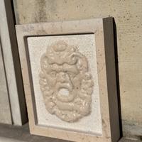 Mascherone Saturno in pietra